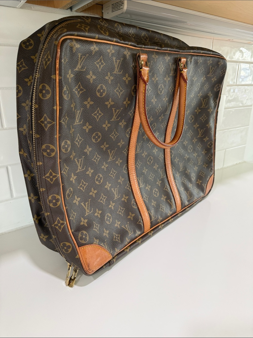 Louis Vuitton Monogram Canvas travel bag with Tan Leather Trim